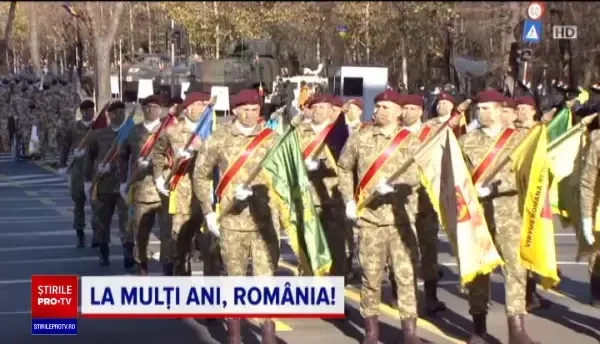 Un detașament a defilat cu măști ”cu mustață” la parada de 1 Decembrie din București