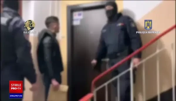 Români care administrau site-uri cu oferte de asasinate la comandă, reținuți de DIICOT