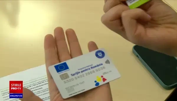Românii cu venituri mici vor primi în aceste zile cardurile electronice cu vouchere de 250 de lei de la stat