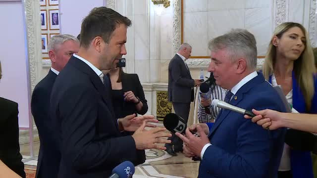 VIDEO. Cătălin Drulă contra Lucian Bode. Schimb de replici pe holurile Parlamentului