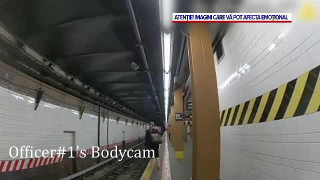 Doi polițiști, salvatorii unei femei din New York, care a căzut pe șinele de metrou