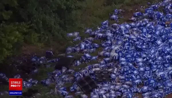 Pagubă pentru un șofer ce transporta mii de cutii de bere. A pierdut toată încărcătura pe drum