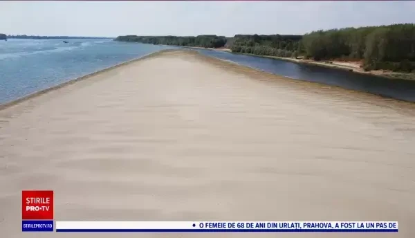 Zeci de nave sunt blocate la Zimnicea din cauza nivelul scăzut al Dunării. În mijlocul fluviului, apa abia ajunge la piept