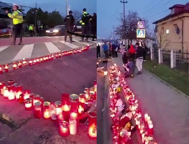 Altar cu lumânări, flori şi jucării în locul în care a fost ucis de TIR băiețelul de trei ani, din Lețcani