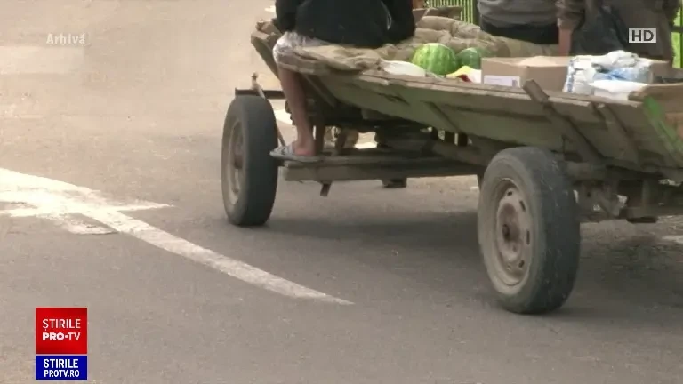 Gestul uluitor făcut de pasagerul unei mașini, când a trecut pe lângă o căruță cu două fetițe de 3 și 7 ani. VIDEO