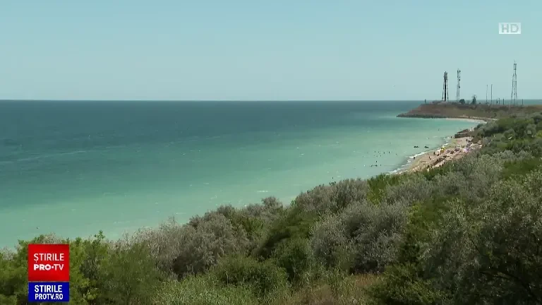 Plaja din România în care marea este turcoaz. Este perfectă pentru turiștii care caută o oază de liniște