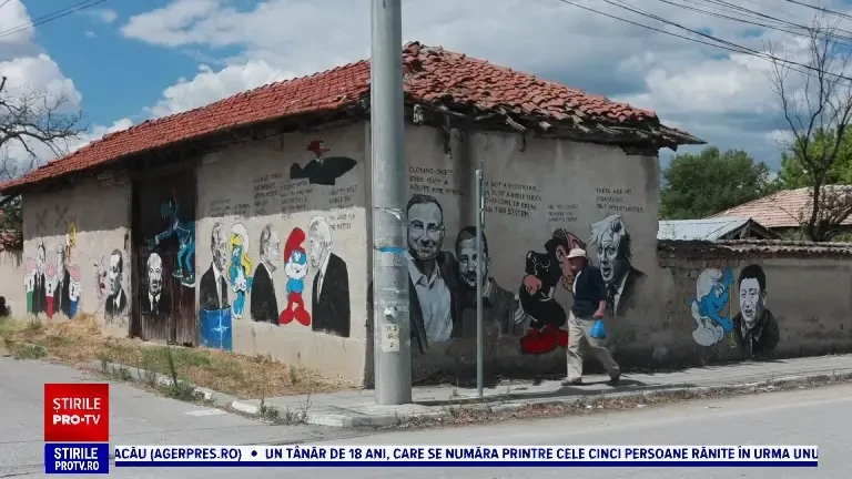 Războiul din Ucraina, transpus pe pereții unei case dintr-un sat bulgăresc. Biden și Macron apar pe alte imobile