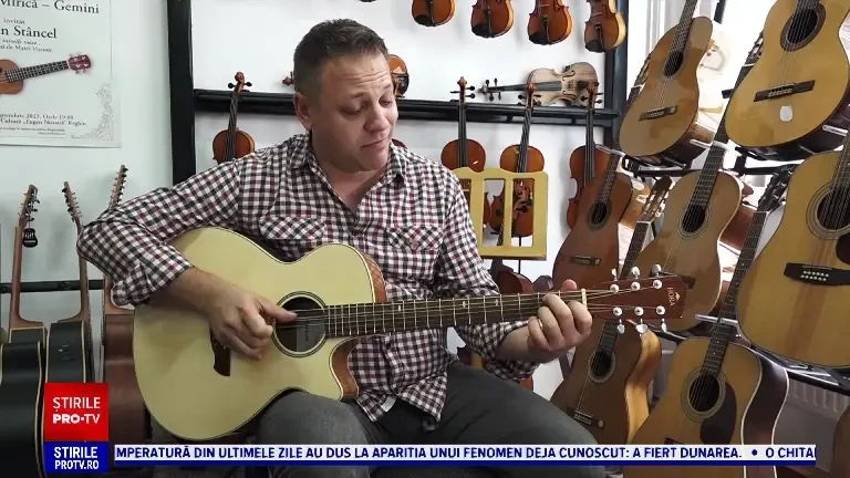 ”Made in Reghin”. Câțiva români pasionați de muzică au creat chitara care imită sunetul de tobe, pian sau acor