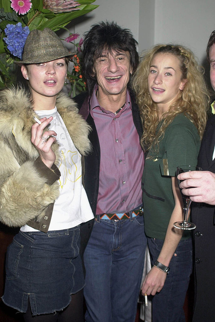 Kate Moss, muzicianul Ronnie Wood de la Rolling Stones și Leah Wood, la petrecerea Destinys Child Show Case Party la Porchester Hall, Londra / GETTY