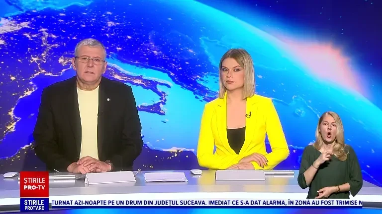 Familie din Roman, terorizată de o vecină. A fost filmată cum lovește cu toporul în tabloul electric