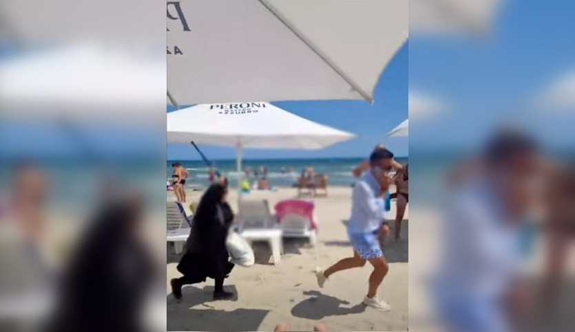 Un bărbat a fost lovit și alergat cu bastonul de o femeie de 50 de ani, pe o plajă din Mamaia. VIDEO