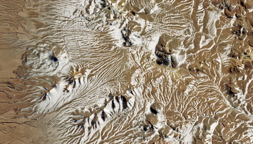 Zăpadă într-unul dintre cele mai uscate locuri de pe Pământ. Peisajul arid a devenit temporar alb