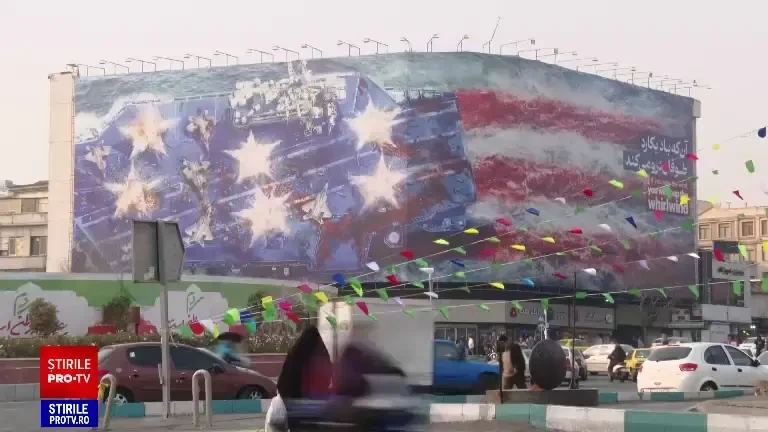 ”Dacă semeni vânt, vei culege furtună”. Iranul avertizează SUA cu un mesaj scris pe un perete uriaș