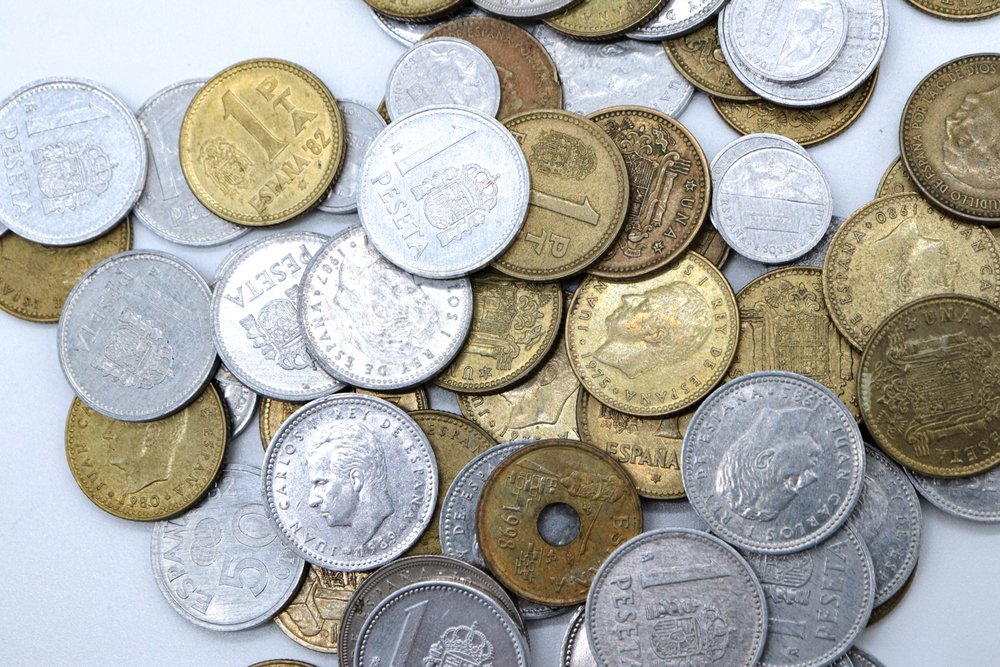 O monedă veche de 5 pesetas, râvnită de colecționari, poate valora acum sute de euro. Eroarea care o face rară